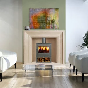 Limestone carved fireplace with log burner fire, white sofa and armchairs, Sandridge Stone Fireplaces, Limestone, Bath Stone, Portland Limestone, Melksham, Wiltshire